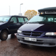 Illustration for article titled Blip: Two Chrysler Minivans Hang Out At A Swedish Gas Station